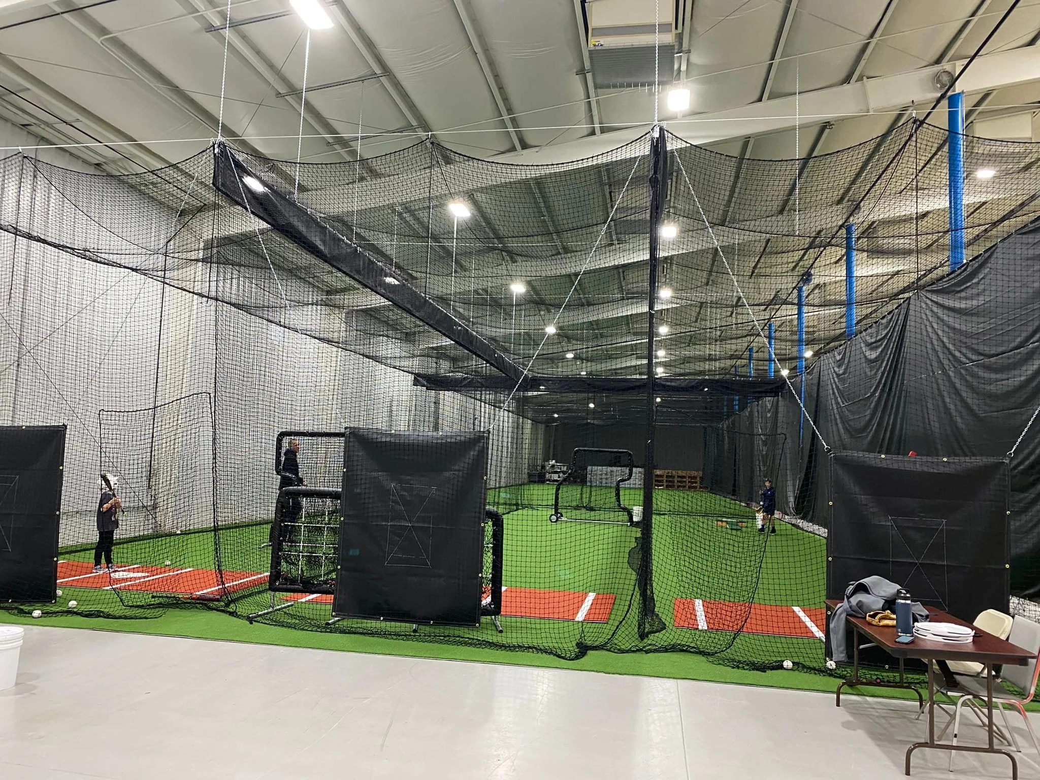 Indoor baseball batting cages and turf at Industry Sports